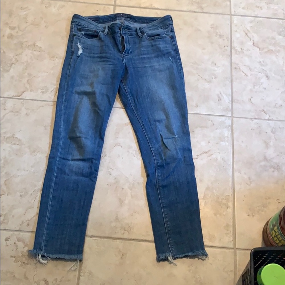 Slightly distressed blue Lucky Jeans